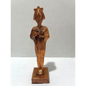 statue depicting the ancient Egyptian god Osiris copper color status figurine